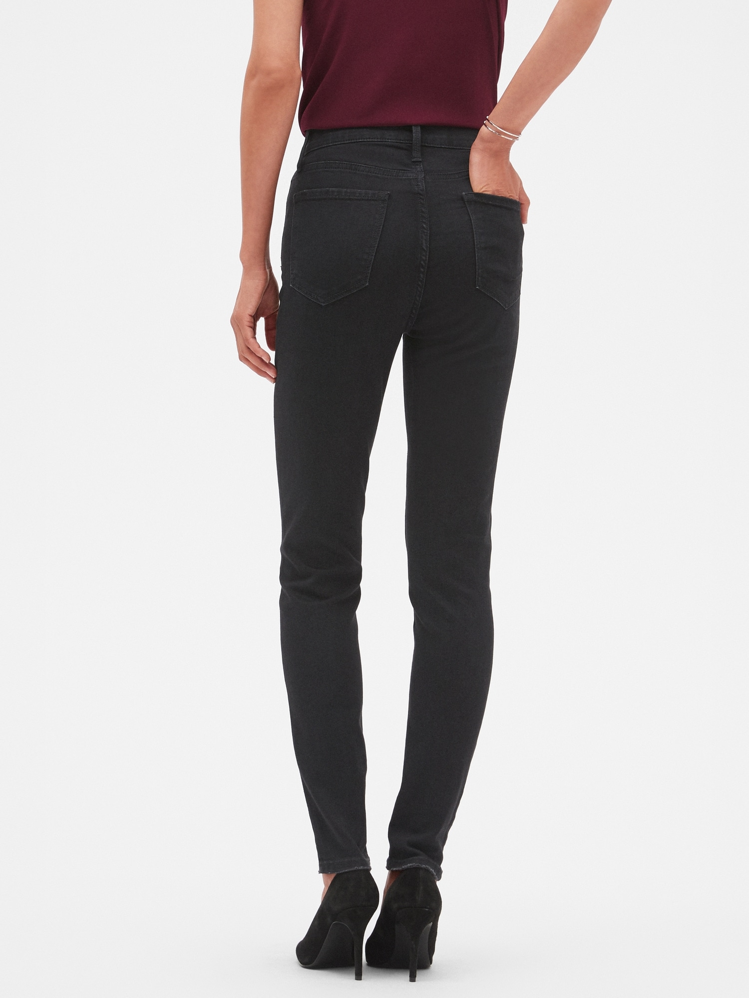 Petite High Rise Destructed Black Denim Skinny Jean