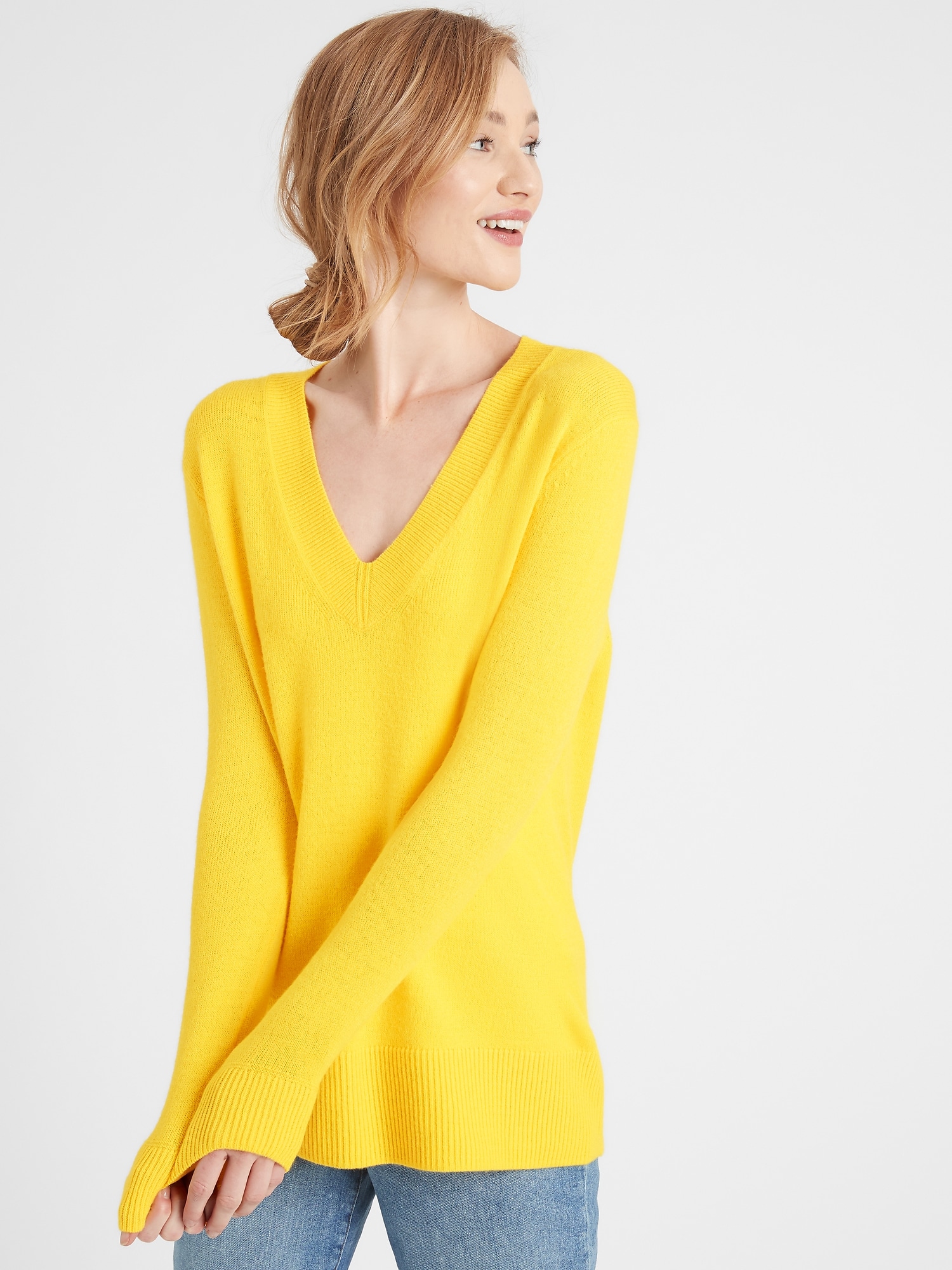 yellow v neck sweater