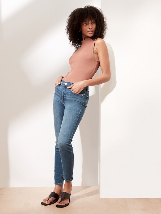 Image number 1 showing, Mid-Rise Soft Touch Medium Wash Skinny Jean