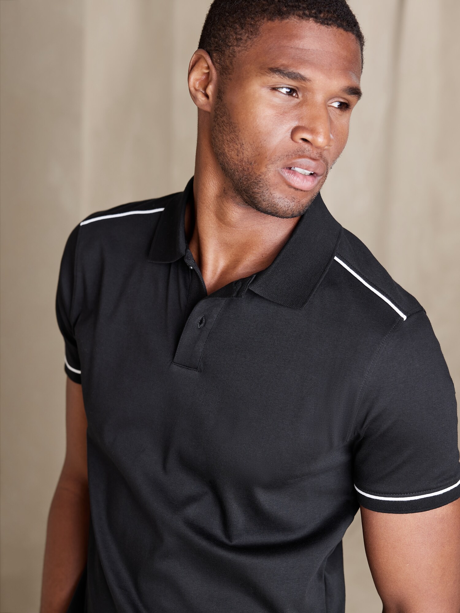 Black performance outlet polo