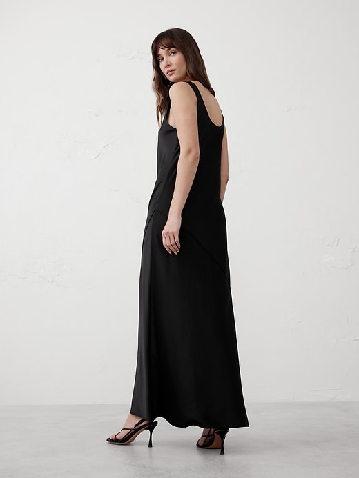 black woven maxi dress Women's Let It Be Easy Black Smocked Waist Zip Maxi Dress | Size: L